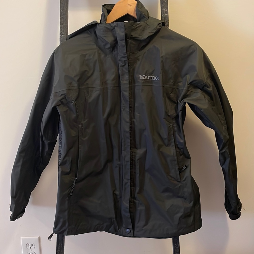 Hooded women’s Marmot rain jacket.